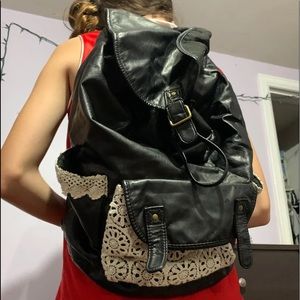 Black faux leather bag